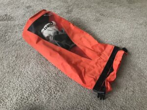 Orange dry bag for use with watercraft