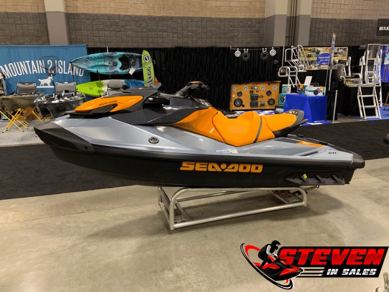Sea-Doo GTI on lifted up stand at boat show. 