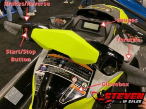 Pointing out all the controls for Sea-Doo like brakes, throttle, start button and mode buttons.