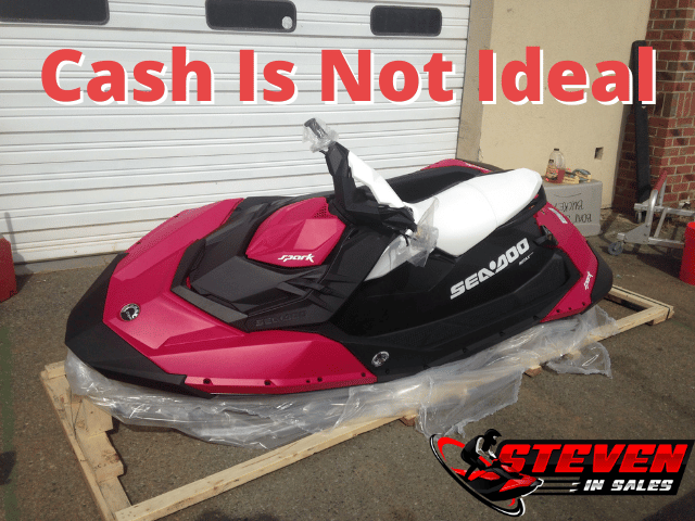 Sea-Doo Spark still in a crate at the dealership cheap model in pink