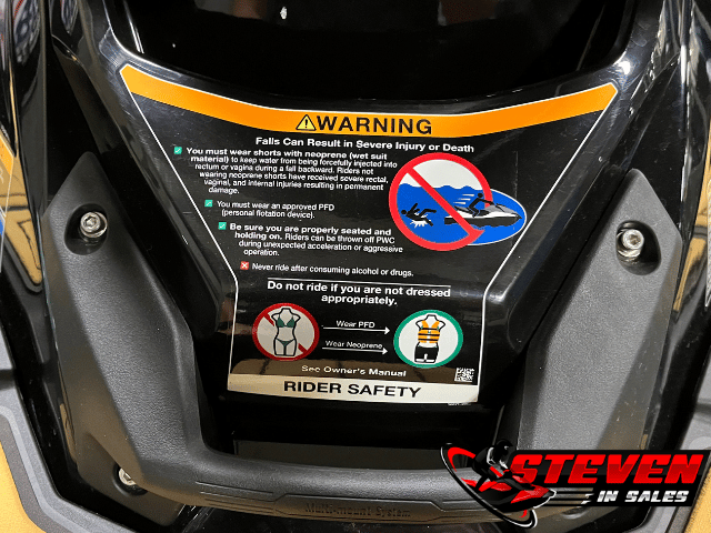 Kawasaki warning sticker about water intrusion if you don't wear pants