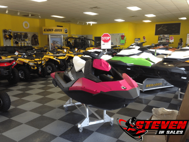 Pink Sea-Doo Spark with Stop sign showing off iBR in showroom
